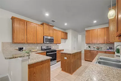 6097 Well Brook Lane, League City, TX 77573 - Photo 18