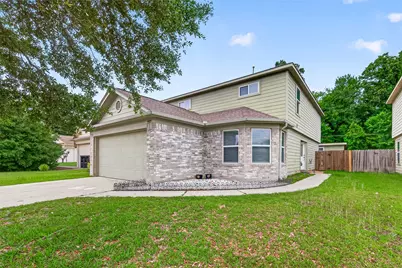 9909 Kingfisher Drive, Conroe, TX 77385 - Photo 1