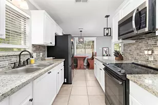 1845 King Arthur Ct, Pinehurst, TX 77630 - Photo 14