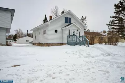 411 NW 9th St, Chisholm, MN 55719 - Photo 1