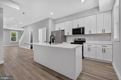 319 E 24th Street, Baltimore, MD 21218 - Photo 1