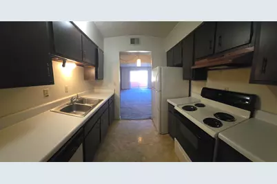 209 W Miracle Strip Parkway #UNIT A203, Mary Esther, FL 32569 - Photo 2