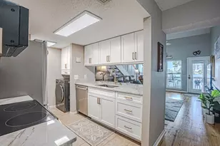 6909 N Lagoon Dr, Panama City Beach, FL 32408 - Photo 12