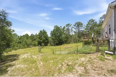 439 Woodpecker Lane, Holt, FL 32564 - Photo 32