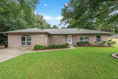 7748 Rustling Pines Drive, Milton, FL 32583 - Photo 1