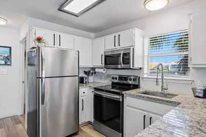 7472 Sunset Harbor Drive #APT 311, Navarre, FL 32566 - Photo 16