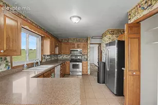 7360 Wilderness Dr, Colorado Springs, CO 80908 - Photo 2