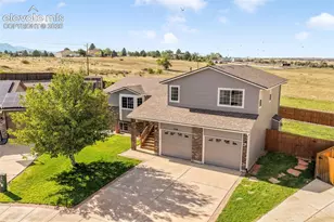 7106 Lone Eagle Ln, Colorado Springs, CO 80925 - Photo 2