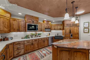 15984 Pole Pine Point, Colorado Springs, CO 80908 - Photo 12