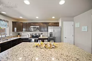 10061 Thunderbolt Trail, Colorado Springs, CO 80925 - Photo 12