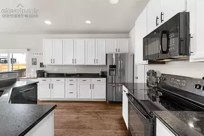 7437 Bigtooth Maple Drive, Colorado Springs, CO 80925 - Photo 12