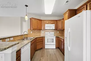 1695 Little Bear Creek Point, Colorado Springs, CO 80904 - Photo 6