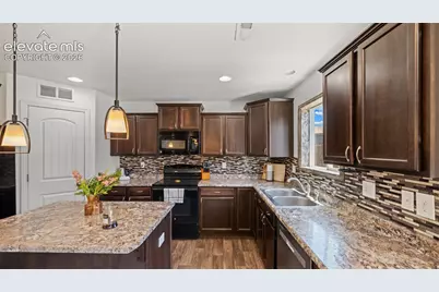 9559 Desert Lily Circle, Colorado Springs, CO 80925 - Photo 8