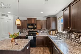 9559 Desert Lily Cir, Colorado Springs, CO 80925 - Photo 8