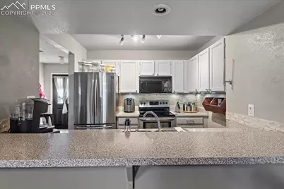 4304 Hunting Meadows Circle, Colorado Springs, CO 80916 - Photo 8