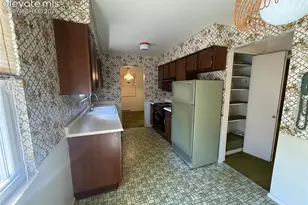 1928 Sussex Ln, Colorado Springs, CO 80909 - Photo 6