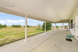18050 Quarterhorse Ln, Colorado Springs, CO 80908 - Photo 8
