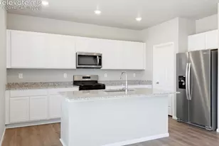 11323 Shadbush Ln, Colorado Springs, CO 80925 - Photo 6