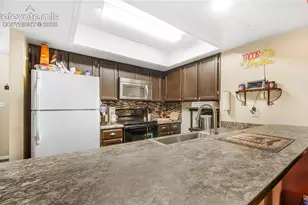1303 Firefly Cir, Colorado Springs, CO 80916 - Photo 6
