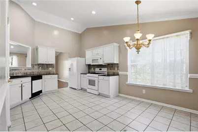 3665 Charlton Ives Drive NW, Lilburn, GA 30047 - Photo 8