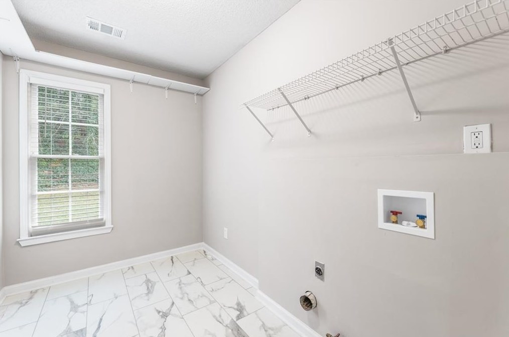 1045 Westwell Run, Alpharetta GA  30022-5893 exterior