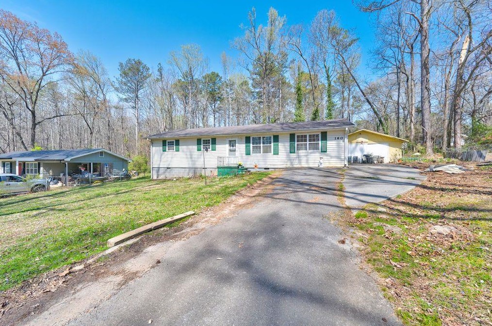160 Sweetwater St, Holly Springs, GA 30114-8570