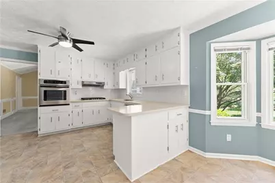 3663 Stonelake Court SW, Lilburn, GA 30047 - Photo 14