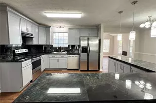 2945 Sawgrass Trail SW, Lilburn, GA 30047 - Photo 1