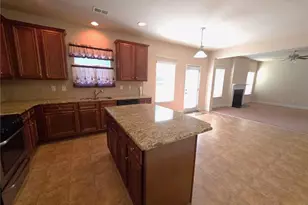 4111 Village Crossing Cir, Ellenwood, GA 30294 - Photo 12