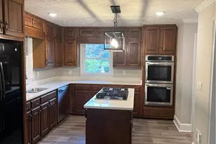 5033 Charlemagne Way SW, Lilburn, GA 30047 - Photo 4