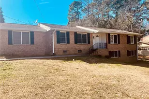 471 Village Green Ct SW, Lilburn, GA 30047 - Photo 1