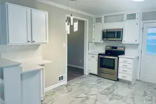 471 Village Green Ct SW, Lilburn, GA 30047 - Photo 4