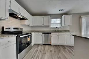 5260 Harbins Point Ln NW, Lilburn, GA 30047 - Photo 4