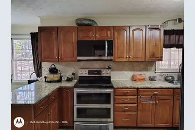 5121 Huntshire Lane, Lilburn, GA 30047 - Photo 16