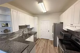 6115 Woodland Ln, Alpharetta, GA 30009 - Photo 6