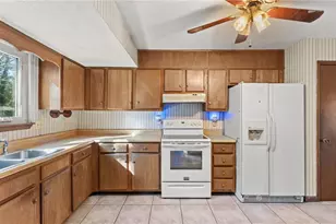 570 Candlewick Ln NW, Lilburn, GA 30047 - Photo 14