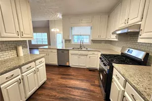 1645 Rushing River Way, Suwanee, GA 30024 - Photo 4