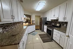 4080 Landress Park Dr NW, Lilburn, GA 30047 - Photo 10