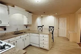 815 Sunfield Dr NW, Lilburn, GA 30047 - Photo 4