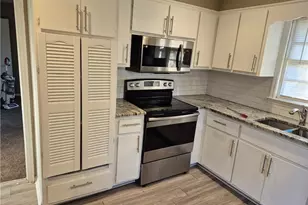 5325 Joan of Arc Pl, Atlanta, GA 30349 - Photo 4