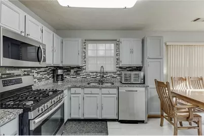 5160 Arrowind Road NW, Lilburn, GA 30047 - Photo 4