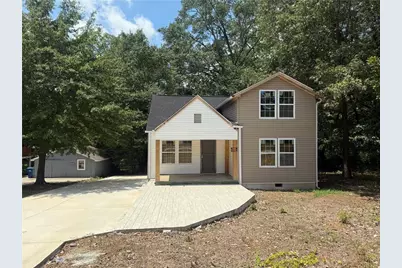 5725 Stonewall Tell Road, Atlanta, GA 30349 - Photo 1