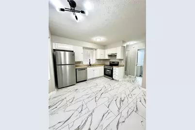 337 Bradley Woods Court NW, Lilburn, GA 30047 - Photo 6