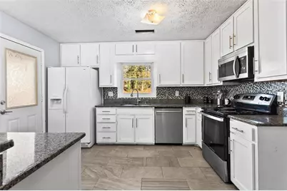 3283 Kimberly Woods Court SW, Lilburn, GA 30047 - Photo 16