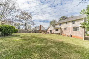 4424 Windsong Ct SW, Lilburn, GA 30047 - Photo 8