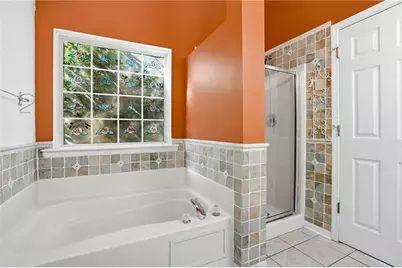 3665 Charlton Ives Drive NW, Lilburn, GA 30047 - Photo 14