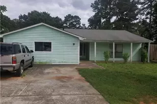 1065 Dickens Rd NW, Lilburn, GA 30047 - Photo 1