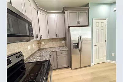 8001 Woodland Lane, Alpharetta, GA 30009 - Photo 4