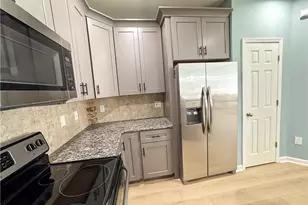 8001 Woodland Ln, Alpharetta, GA 30009 - Photo 4