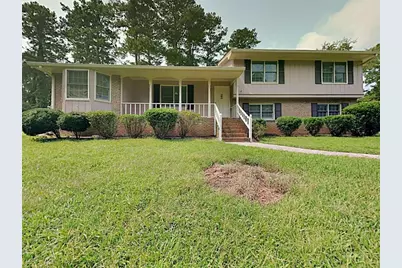 551 Village Green Court, Lilburn, GA 30047 - Photo 1